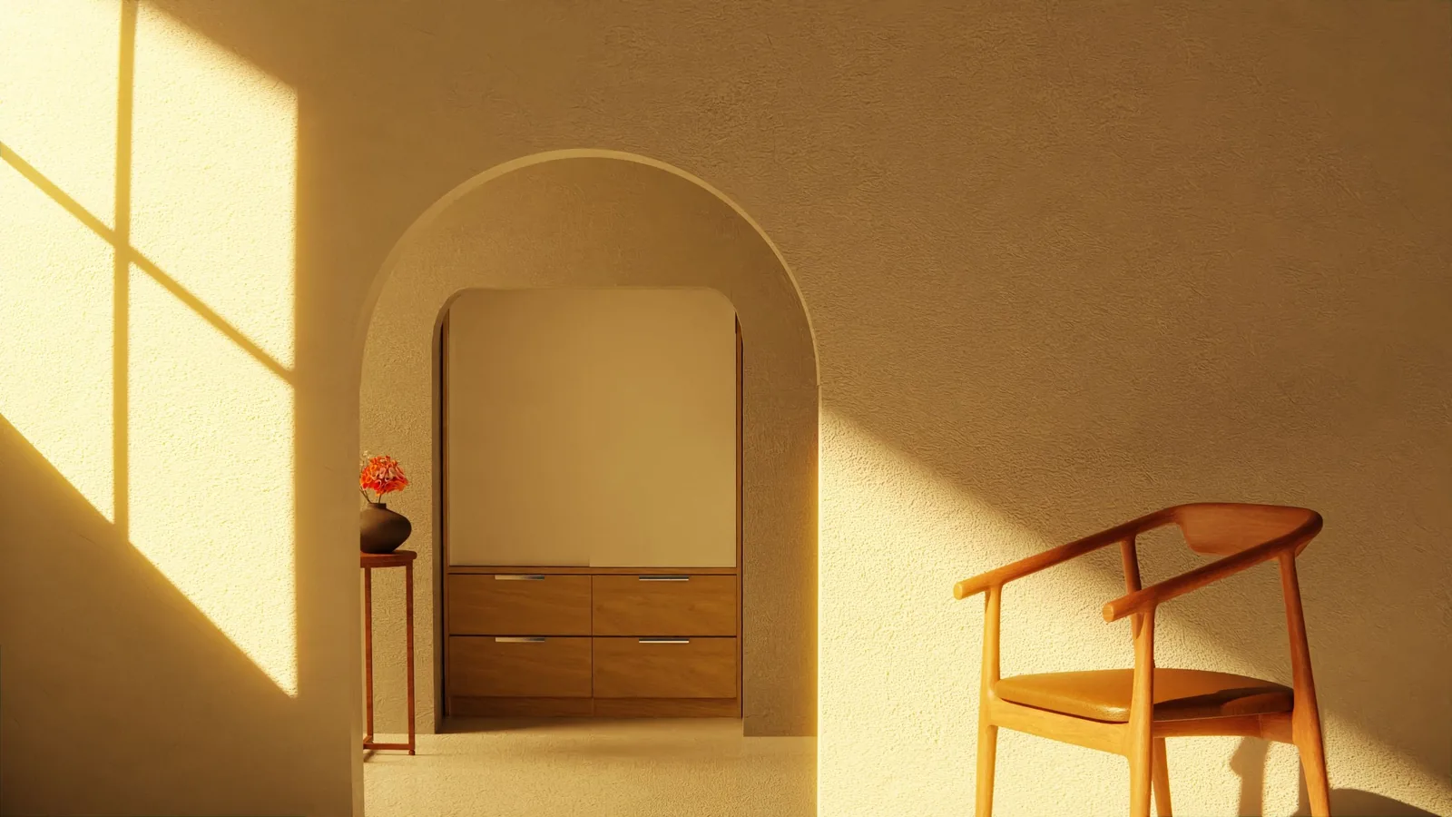 Warm sunlight through an arched opening on a chair