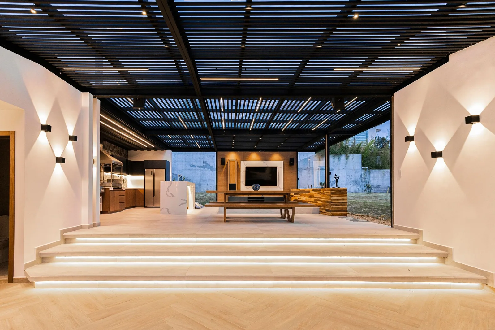 A bright open living area with a long sofa