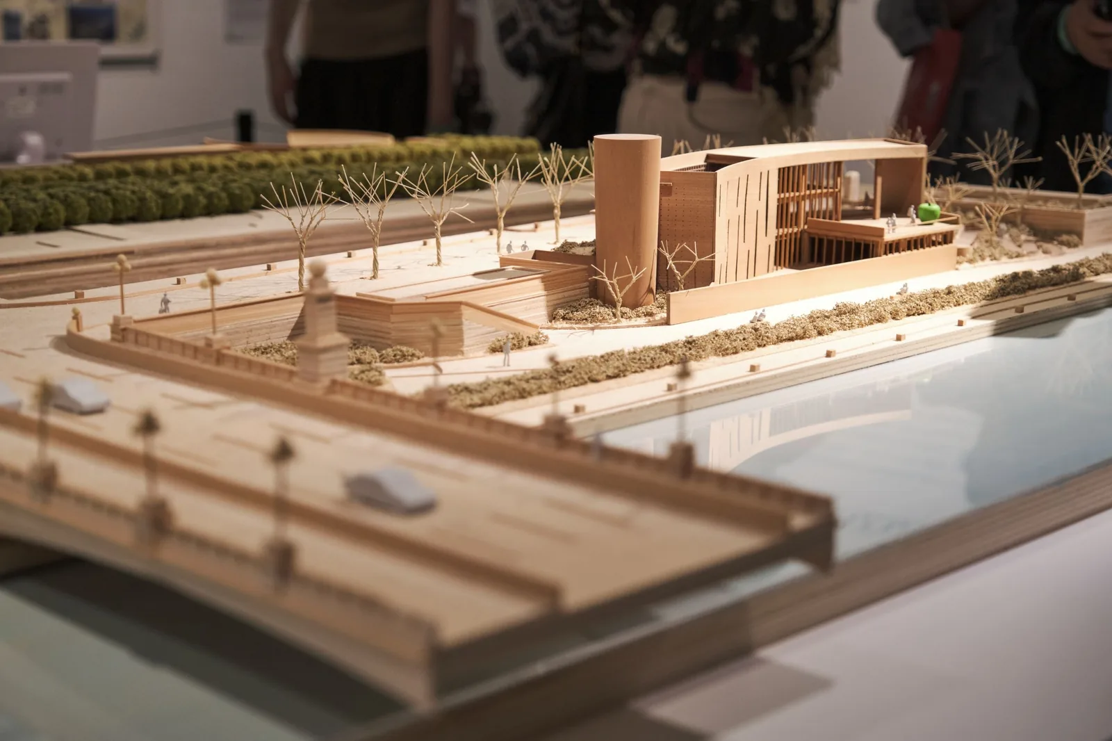 A timber scale model of a long low building